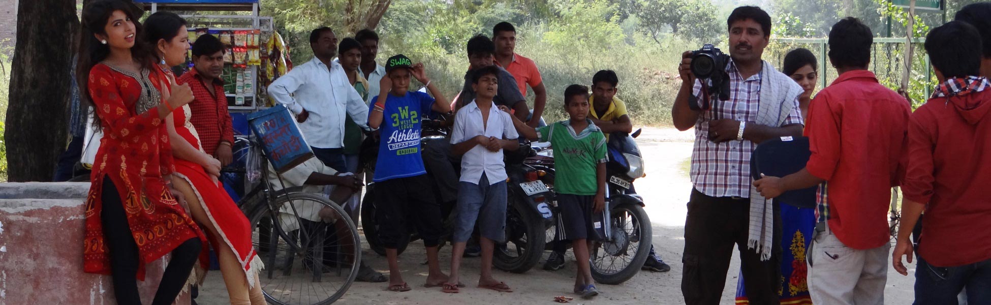 A film crew filming a scene about social awareness in Ghaziabad, Uttar Pradesh, with local onlookers watching the production process. film shooting locations in Banswara, video shooting locations in Banswara, tv shooting locations in Banswara, shooting locations in Banswara