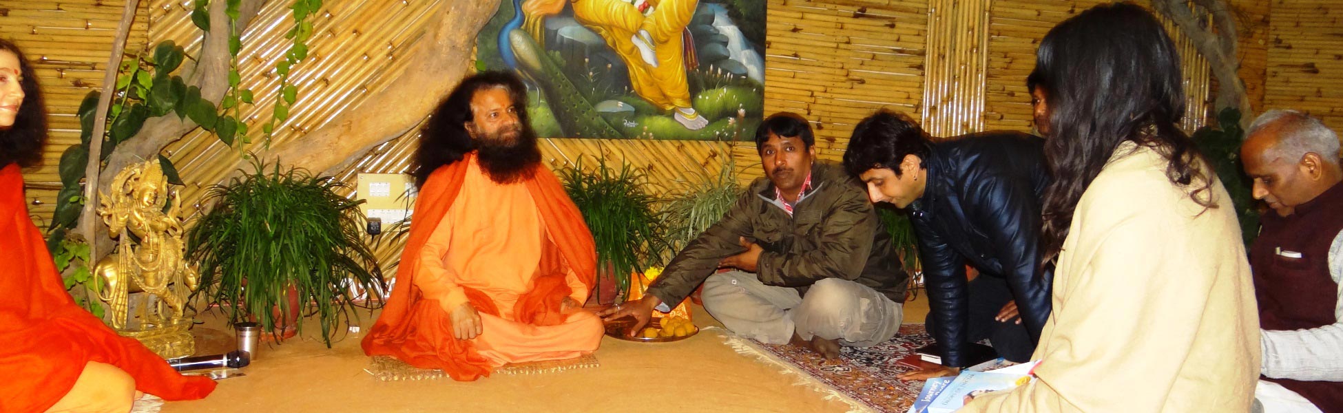 Trisna Films filmmaker Avinash Kumar collaborating with Swami Chidanand Saraswati during the production of the Eight Limbs of Yoga documentary in Rishikesh, Uttarakhand. film production house in Baran, video production house in Baran, tv production house in Baran, production house in Baran, film production company in Baran, video production company in Baran, tv production company in Baran, production company in Baran