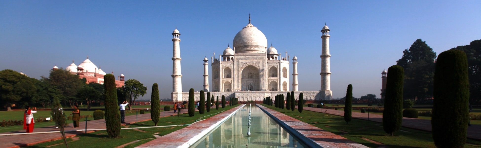 Panoramic daylight view of the iconic ivory-white marble Taj Mahal mausoleum, surrounding gardens, reflection pool, and four minarets in Agra, India, demonstrating prime angles for heritage film productions. film production house in Benin, film production house in porto novo, video production house in Benin, video production house in porto novo, tv production house in Benin, tv production house in porto novo, production house in Benin, production house in porto novo, film production company in Benin, film production company in porto novo, video production company in Benin, video production company in porto novo, tv production company in Benin, tv production company in porto novo, production company in Benin, production company in porto novo