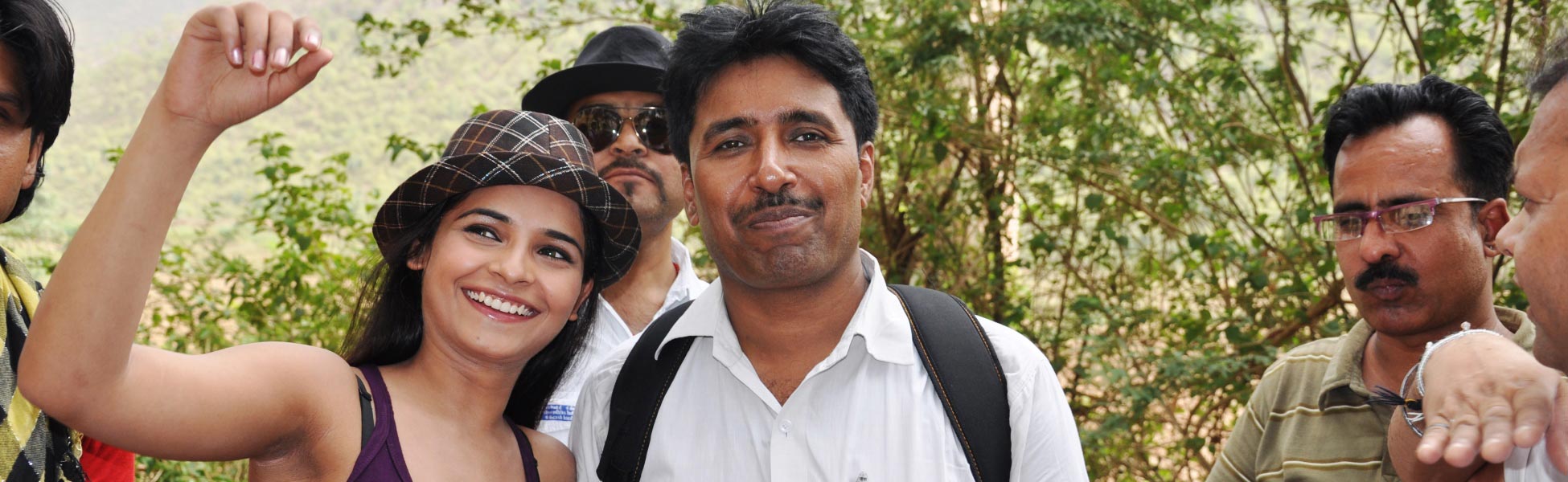 Smiling Indian cast and crew members outdoors on set during the filming of the Namun Chaa Indo-Uzbek music video. fixer in Betul, film fixer in Betul, media fixer in Betul, movie fixer in Betul, production fixer in Betul, line producer in Betul