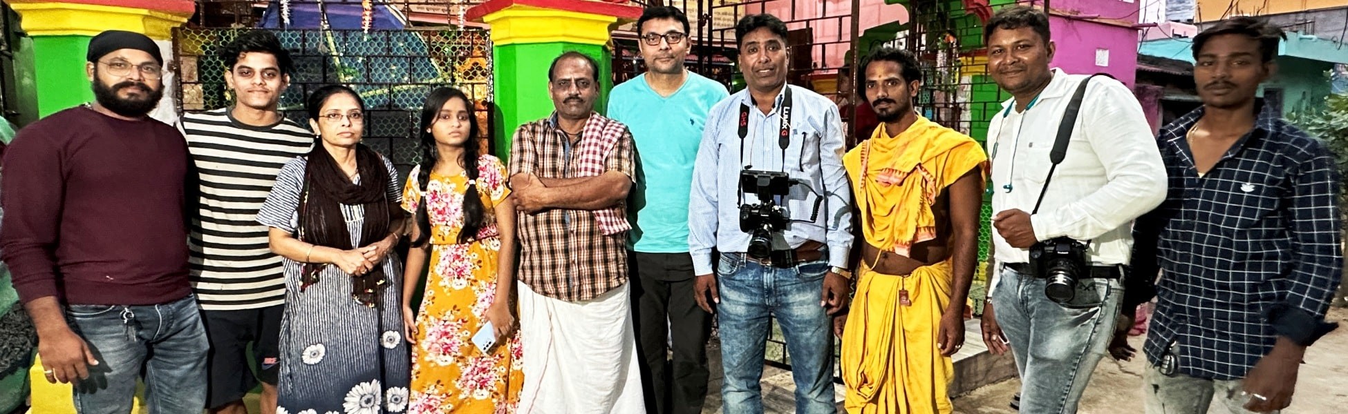 Cast, crew, and a client from Trisna Films® posing together with camera equipment outside a vibrant building during the short film production of 'Revenge: The Prelude' in Puri, Odisha, India. film production house in india, film production house in Delhi, film production house in mumbai, film production house in pune, film production house in sonipat, film production house in begusarai, video production house in india, video production house in Delhi, video production house in mumbai, video production house in pune, video production house in sonipat, video production house in begusarai, tv production house in india, tv production house in delhi, tv production house in mumbai, tv production house in pune, tv production house in sonipat, tv production house in begusarai, production house in india, production house in delhi, production house in mumbai, production house in pune, production house in sonipat, production house in begusarai, film production company in india, film production company in delhi, film production company in mumbai, film production company in pune, film production company in sonipat, film production company in begusarai, video production company in india, video production company in delhi, video production company in mumbai, video production company in pune, video production company in sonipat, video production company in begusarai, tv production company in india, tv production company in delhi, tv production company in mumbai, tv production company in pune, tv production company in sonipat, tv production company in begusarai, production company in india, production company in delhi, production company in mumbai, production company in pune, production company in sonipat, production company in begusarai