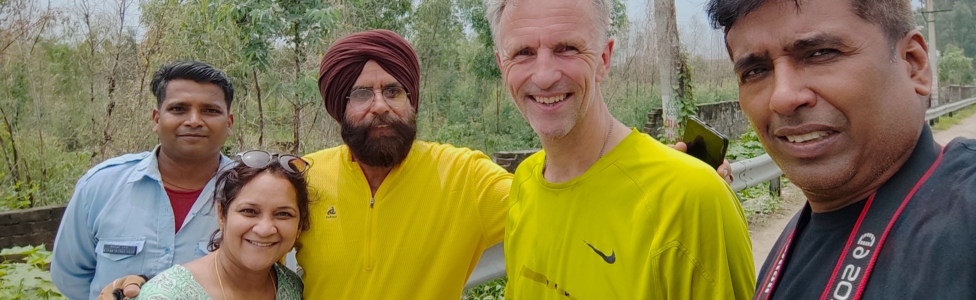 Dr. Edo de Vette from the Netherlands posing with cyclist Prof. Balwinder Singh Mohie and companions at the Ludhiana bypass, Punjab, India, during a documentary or travel project. film shooting locations in haryana, film shooting locations in sonipat, video shooting locations in haryana, video shooting locations in sonipat, tv shooting locations in haryana, tv shooting locations in sonipat, shooting locations in haryana, shooting locations in sonipat