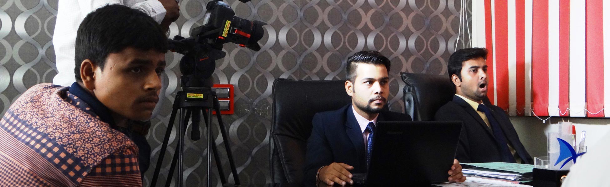 Behind-the-scenes look at Trisna Films® cast and crew during a motivational video production in a Ghaziabad office studio, featuring professional lighting, camera equipment, and actors in business attire. film production house in Austria, film production house in vienna, video production house in Austria, video production house in vienna, tv production house in Austria, tv production house in vienna, production house in Austria, production house in vienna, film production company in austria, film production company in vienna, video production company in Austria, video production company in vienna, tv production company in Austria, tv production company in vienna, production company in Austria, production company in vienna